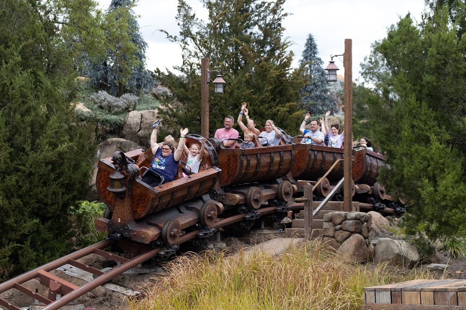Seven Dwarfs Mine Train — Custom swaying-car family coaster, Magic Kingdom